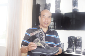 李雪飆：一雙“鞋”行走天下